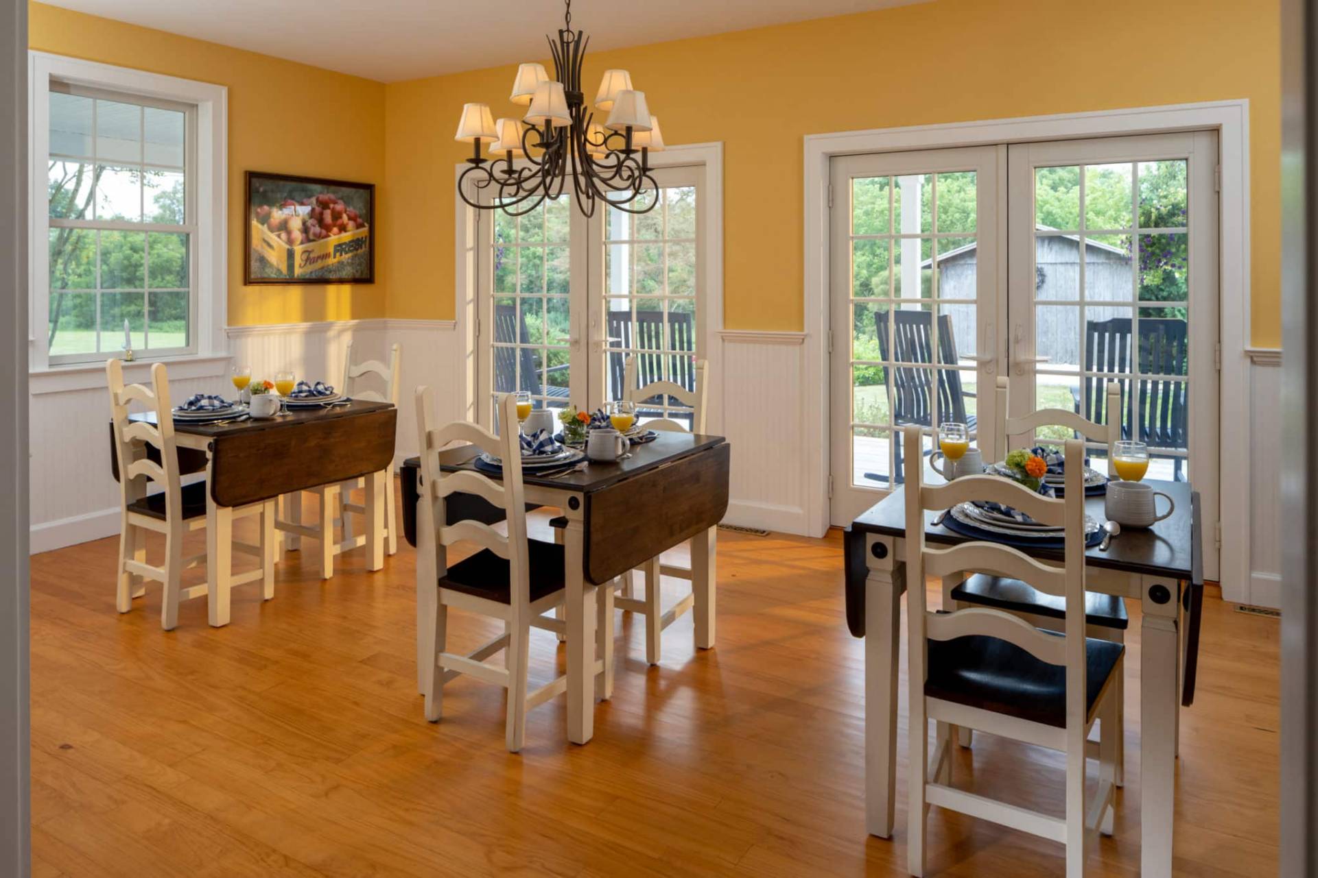 dining rooms, three tables, chairs, yellow paint